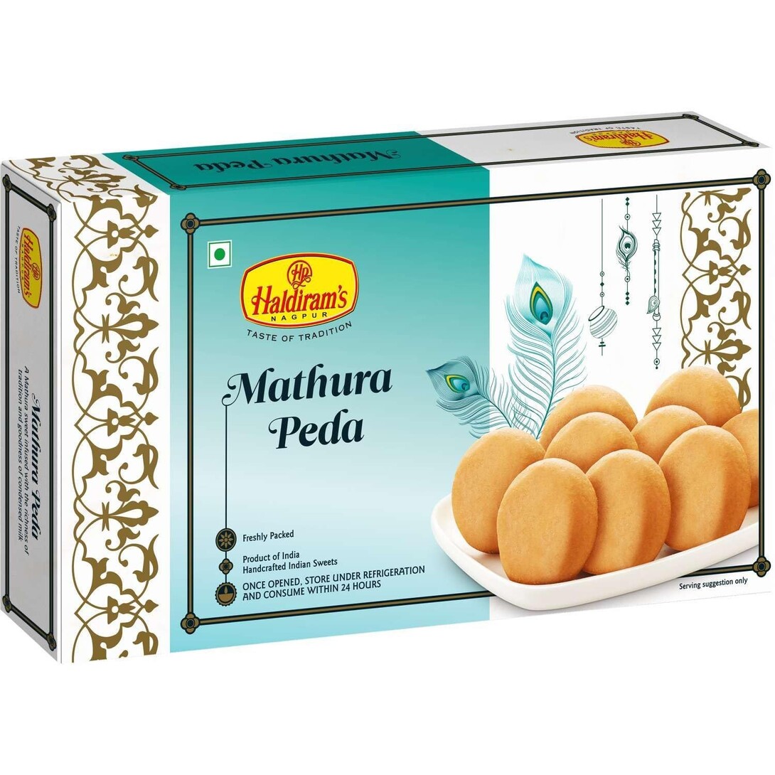 Haldiram's Nagpur Mathura Peda 250g  A caramelized sweet from Mathura with a distinct deep flavor and grainy texture, loved across generations